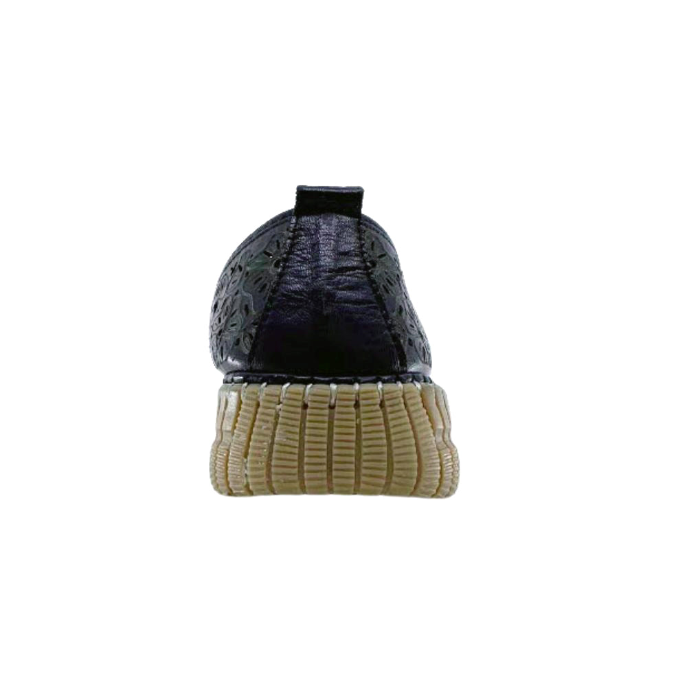 Back of black slip-on loafer shoe with a textured sole on a white background
