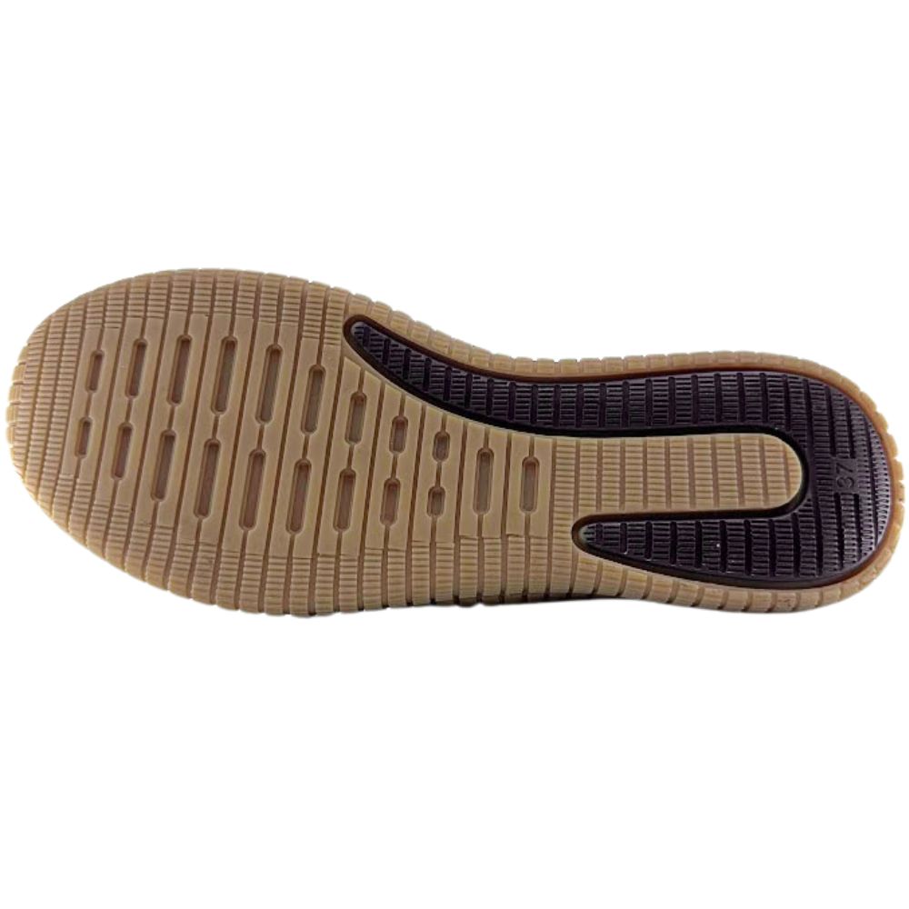 Close-up of a shoe sole with a textured pattern on a white background