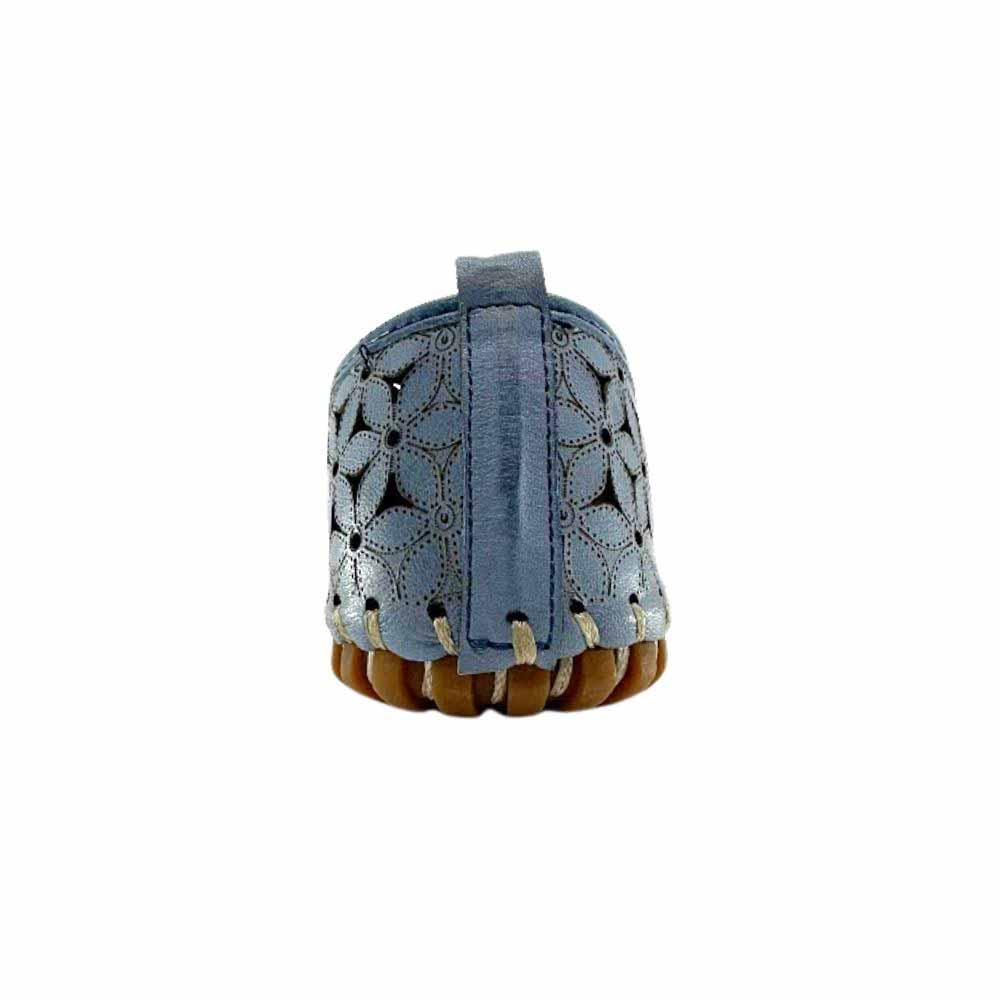 The back of a denim blue laser-cut Cabello leather loafer, shown against a white background.