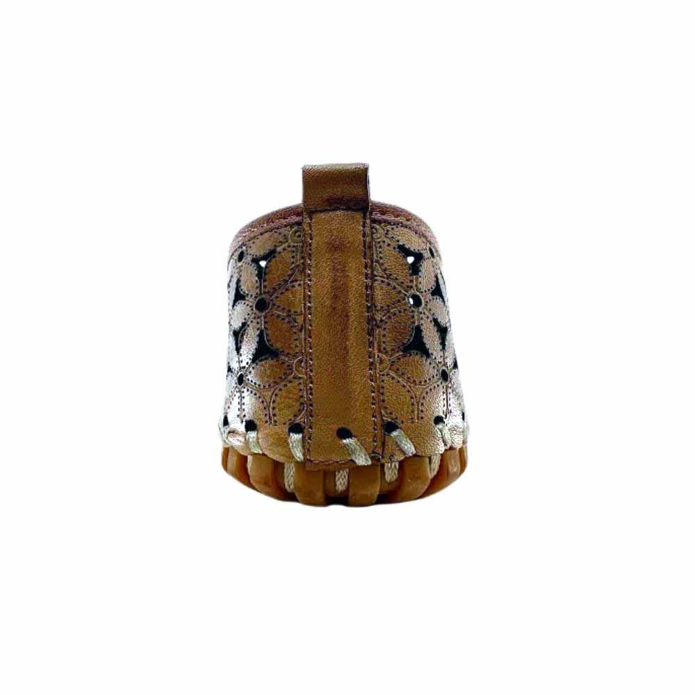 The back view of a tan laser-cut leather loafer, against a white background.