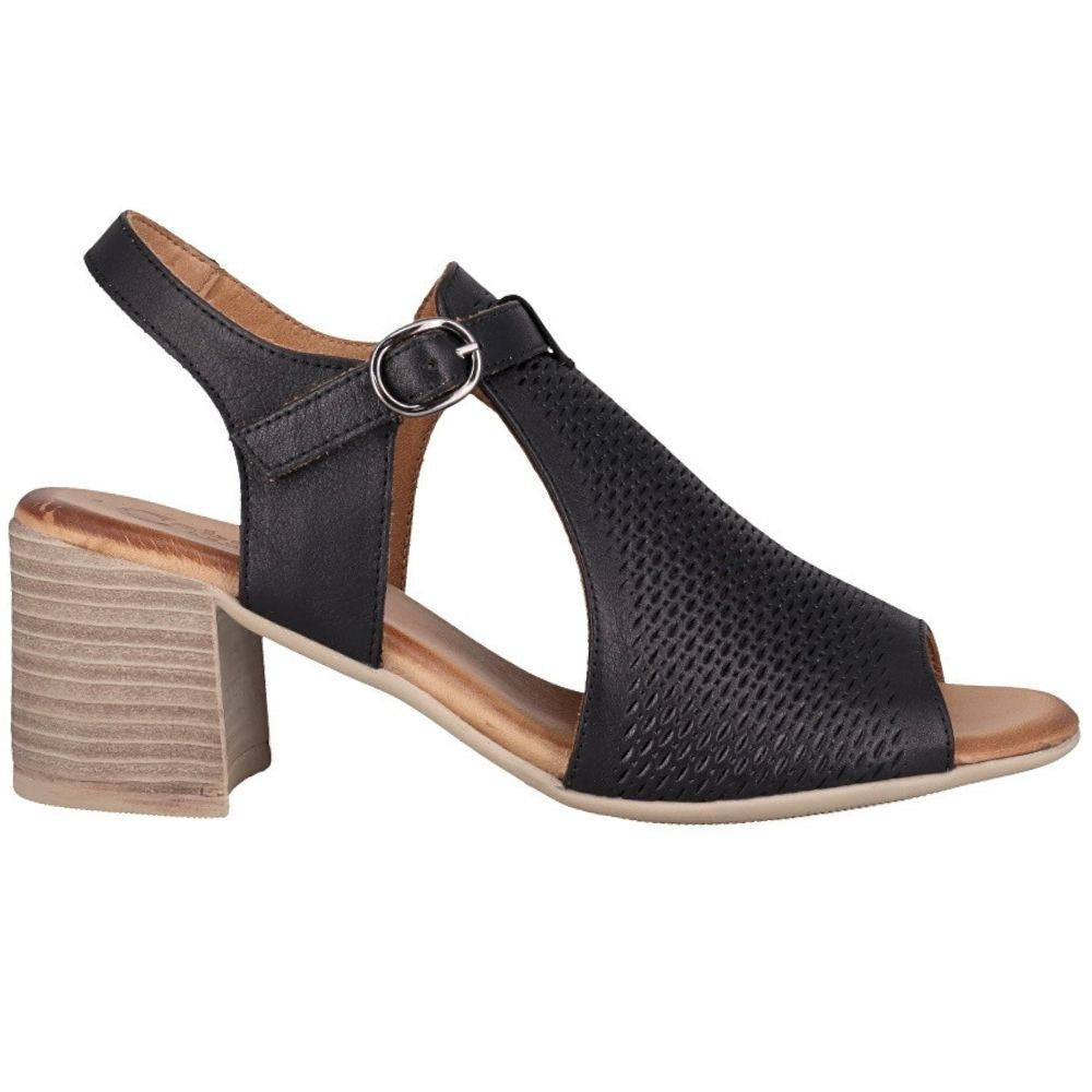 A black heeled sandal with a laser-cut leather upper, adjustable silver buckle and mid-height block heel, against a white background.