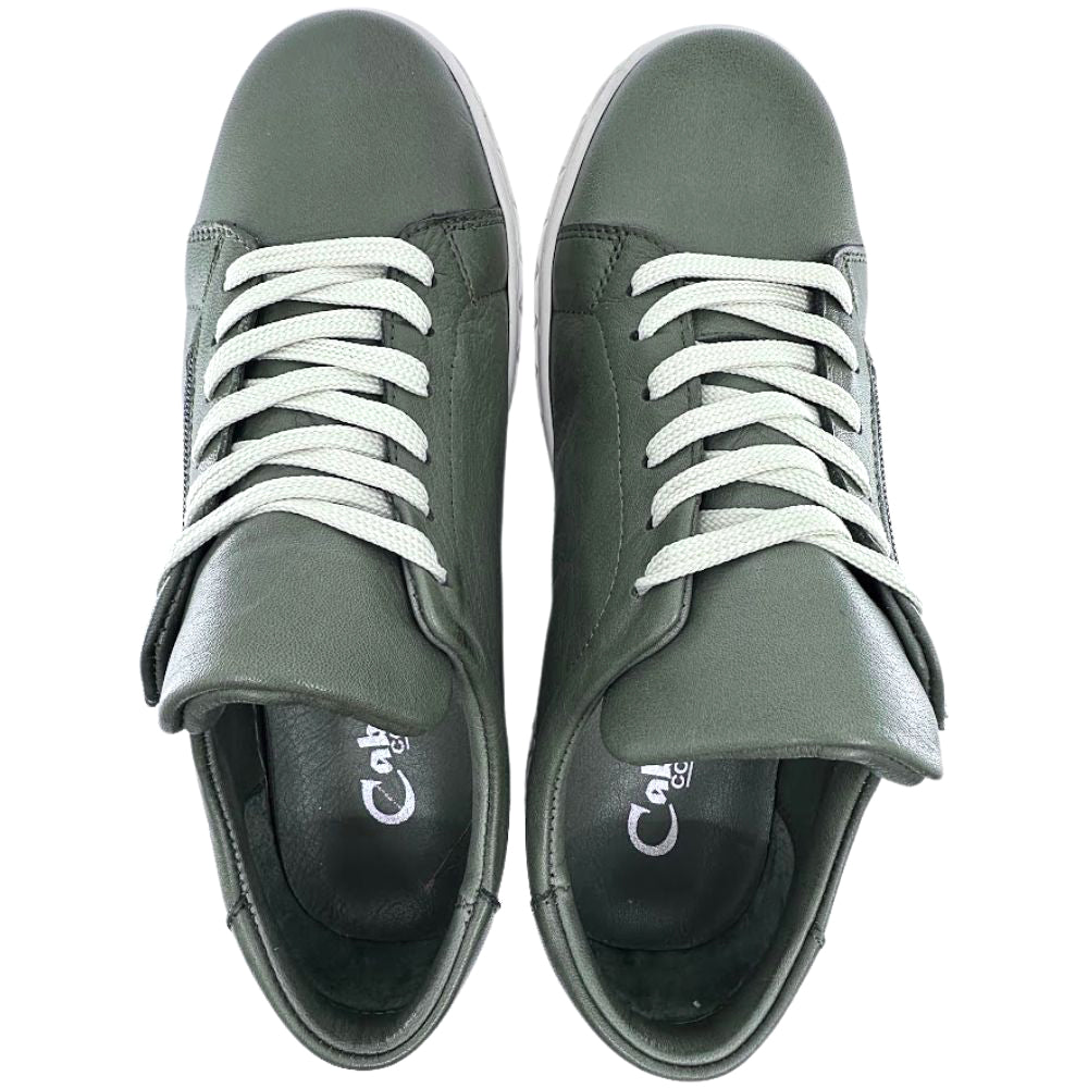 Pair of khaki leather sneakers with beige laces on a white background