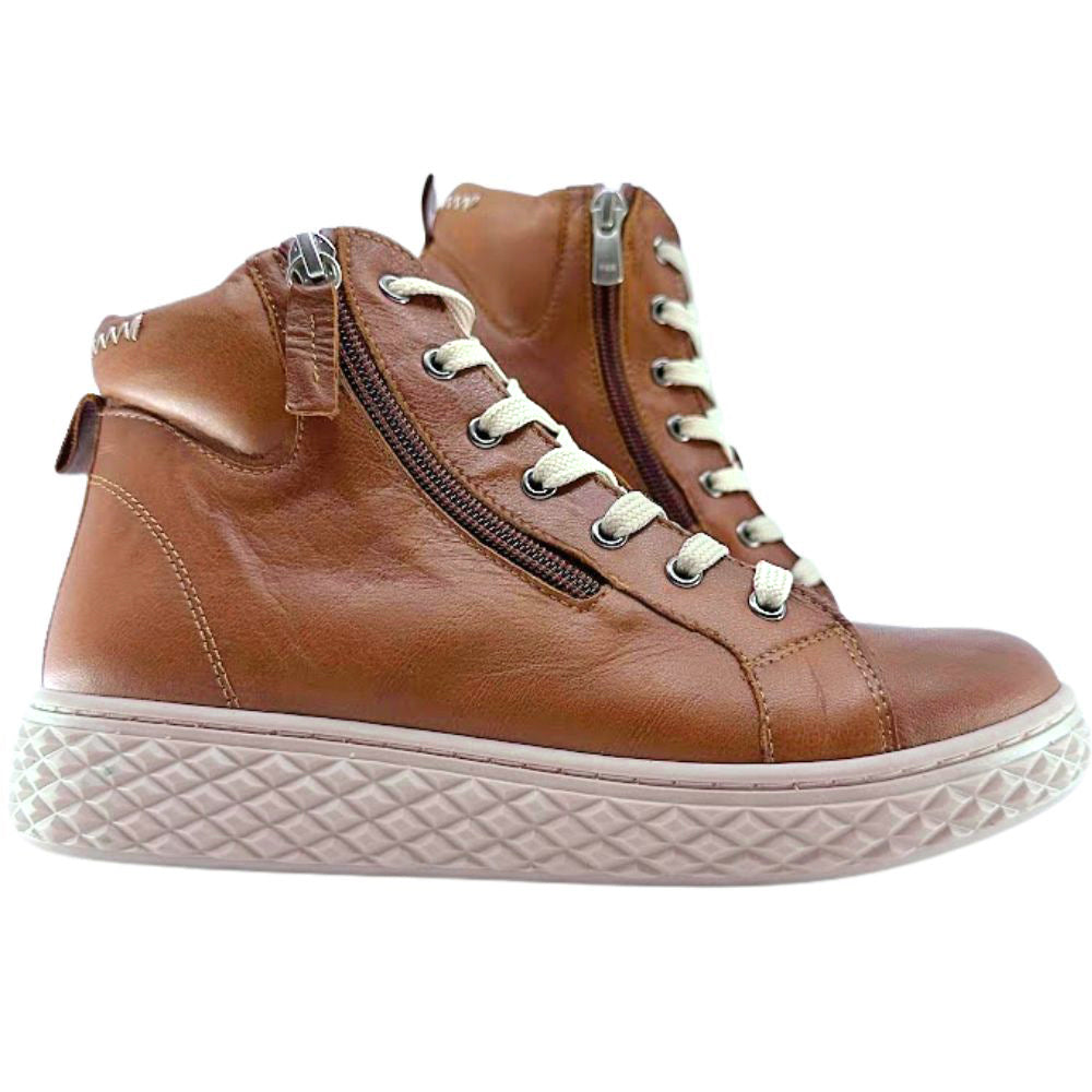 Tan leather ankle boot with white soles on a white background