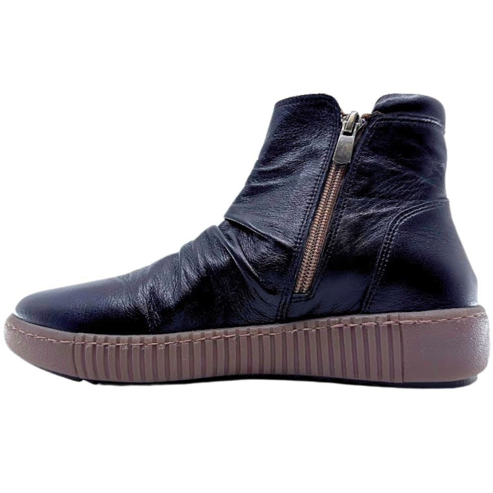 Black leather ankle boot with a zipper on a white background