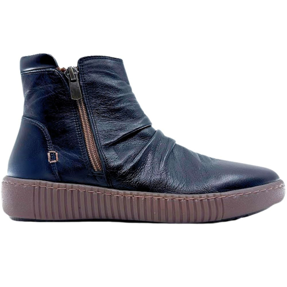 Black leather ankle boot with a zipper on a white background