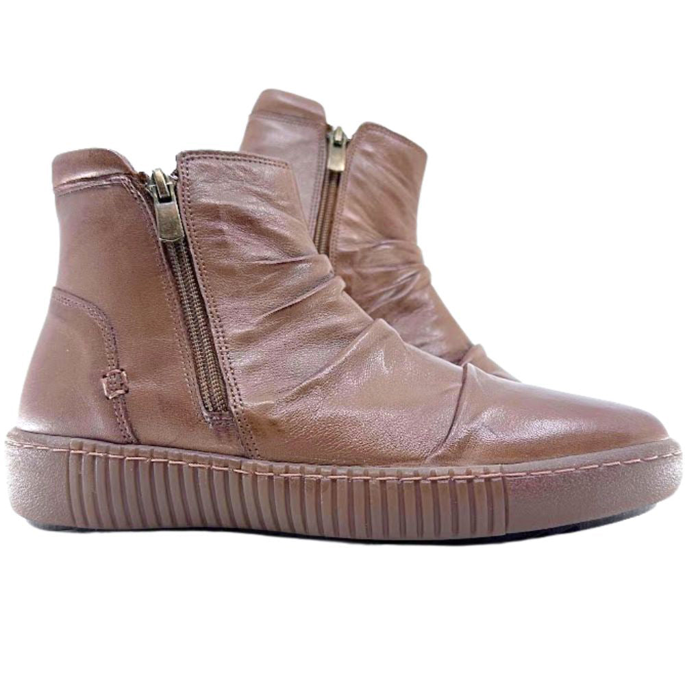 Pair of brown leather ankle boots with zippers on a white background