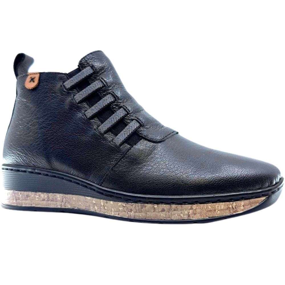Black leather shoe with a cork sole on a white background