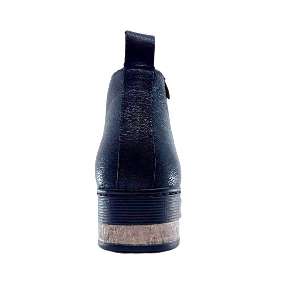 Black leather boot with a textured sole on a white background