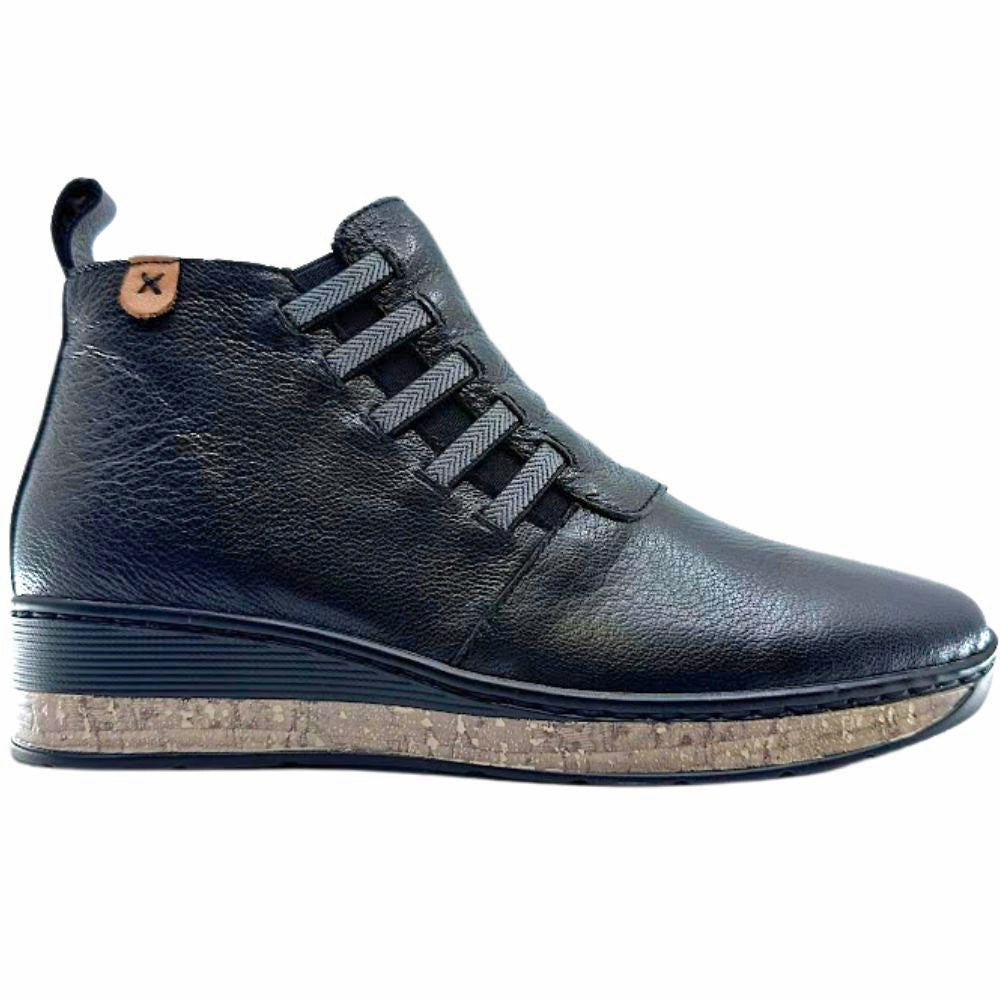 Black leather shoe with herringbone detail on a white background