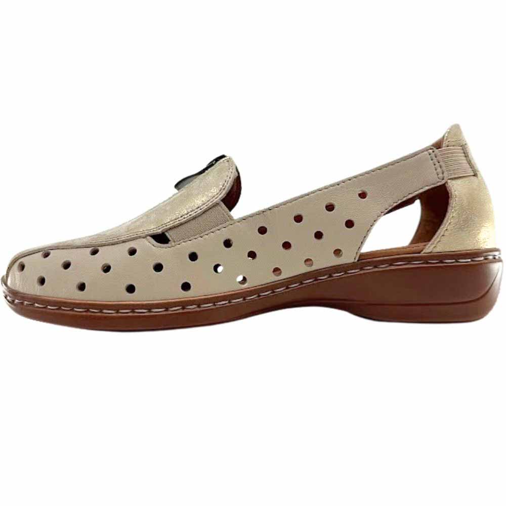 A beige perforated leather slip on shoe with a gold mottle embellished upper, central zip and a brown low wedge outsole, against a white background.