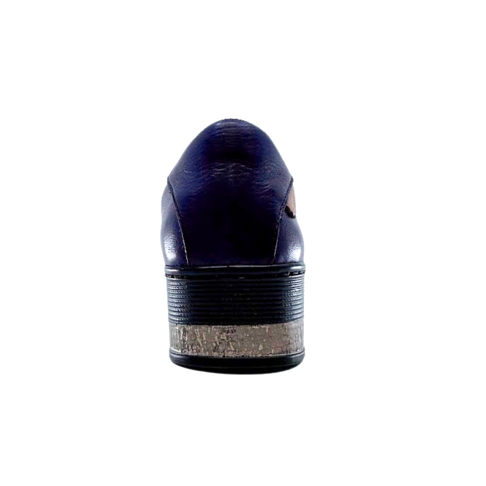 Back of navy shoe with a textured sole on a white background