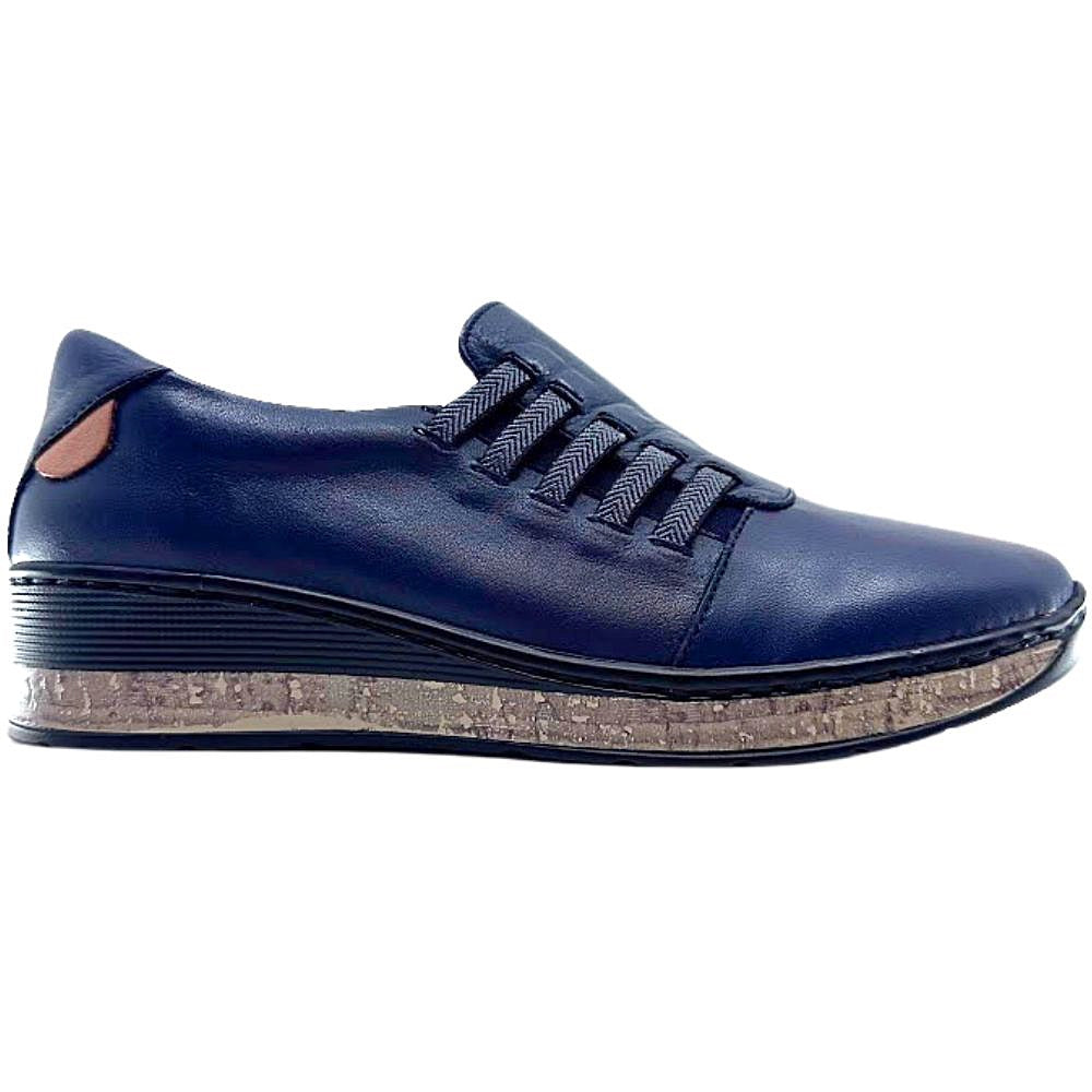 Navy blue shoe with cork sole on a white background
