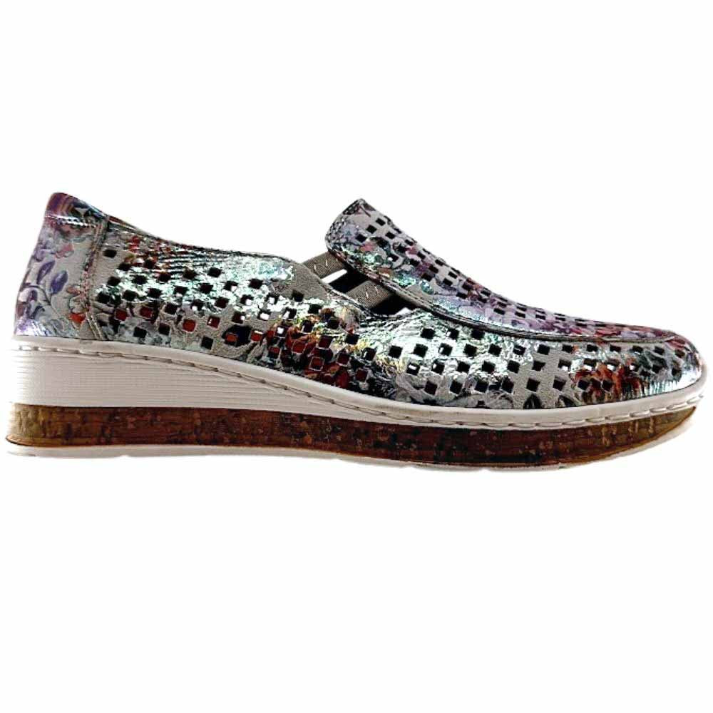 A women's slip-on wedge shoe featuring a metallic multicolor floral-patterned upper with a textured perforated design, a cork-look midsole, and a white stitched edge.