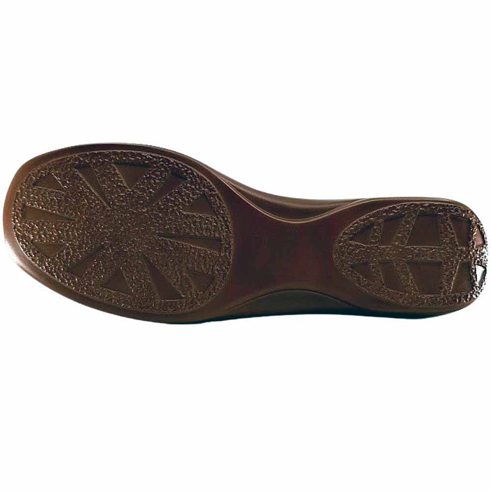 The brown rubber outsole of a sandal showing a tread pattern, against a white background.