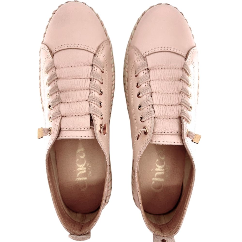 A pair of light pink leather sneakers, shown from a top-down view on a white background. The brand name 'Chica Brazil' is printed on the insole.