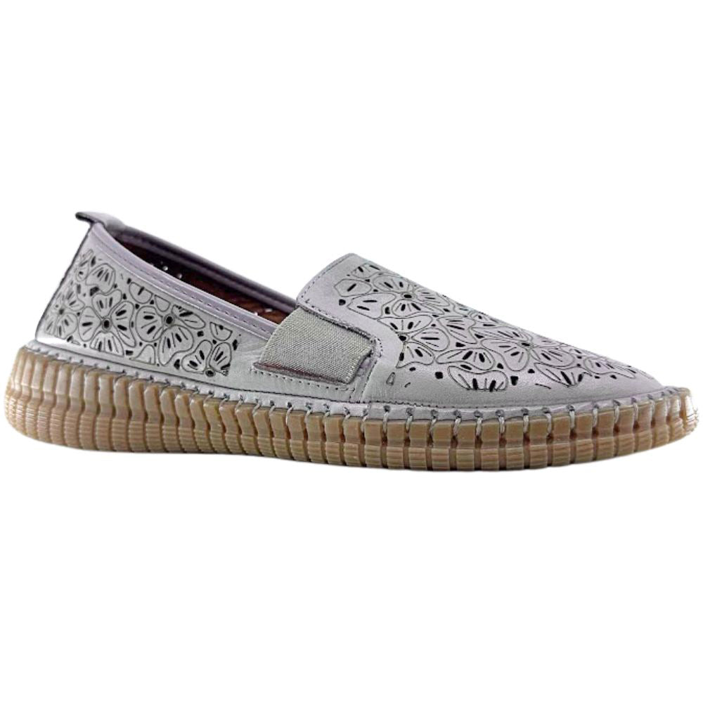 Taupe slip-on loafer shoe with floral cut-out design on a white background