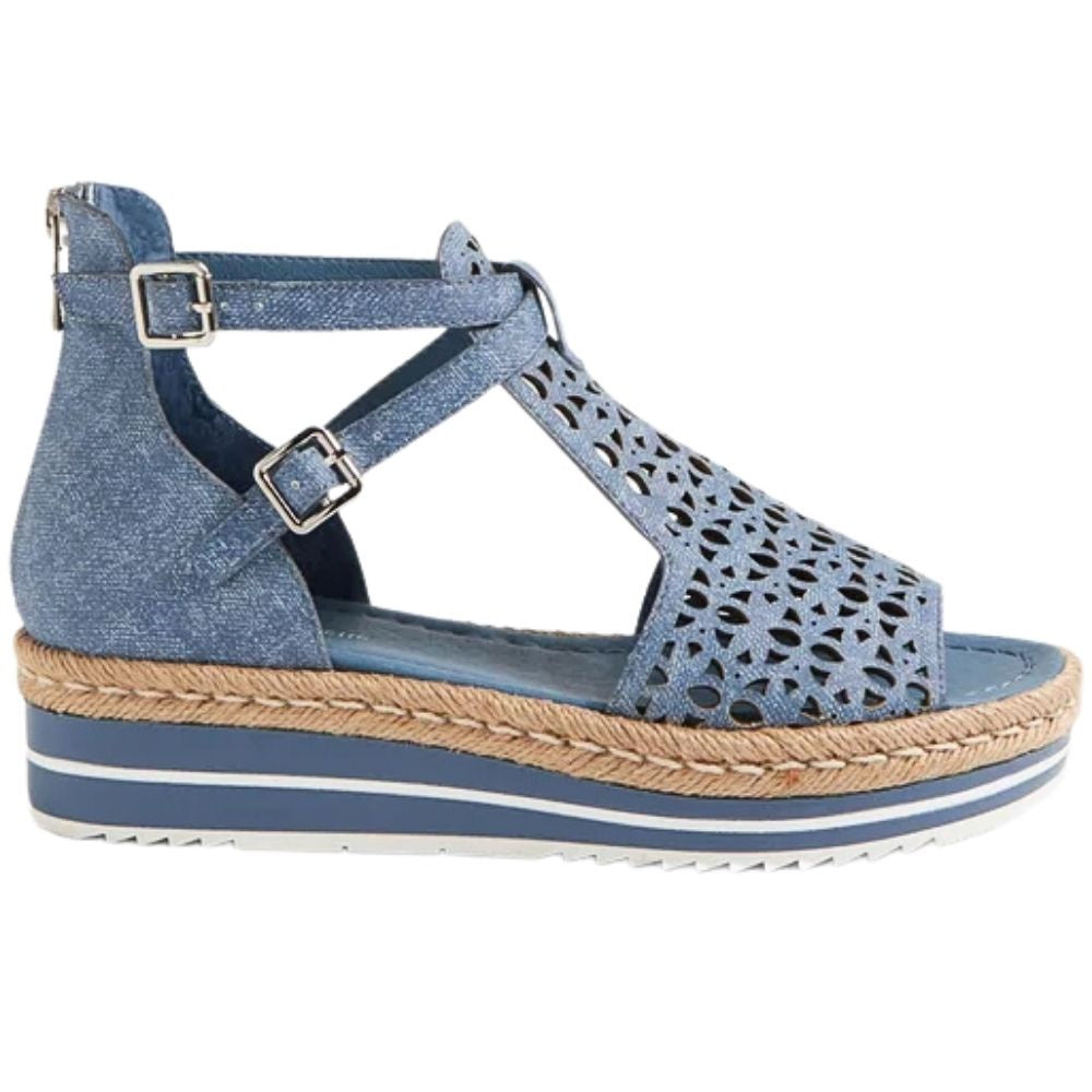 A women's platform wedge sandal in a denim blue leather with laser-cut upper details, ankle straps, and a jute-wrapped sole, shown against a white background.