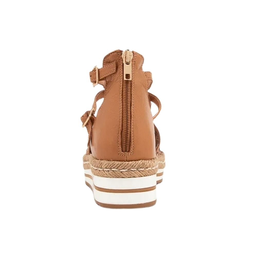 A single tan leather wedge sandal with a rear zipper and ankle strap, featuring a braided jute-wrapped platform wedge and a white midsole stripe, shown from a rear three-quarter view on a white background.