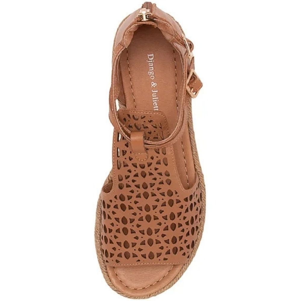A single tan leather wedge sandal with a floral laser-cut pattern on the upper, featuring a braided jute-wrapped platform sole and a side buckle strap, shown from a top-down view on a white background.