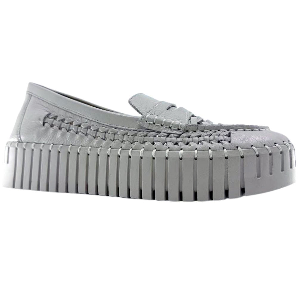 Beige woven leather loafer with a unique sole design on a white background