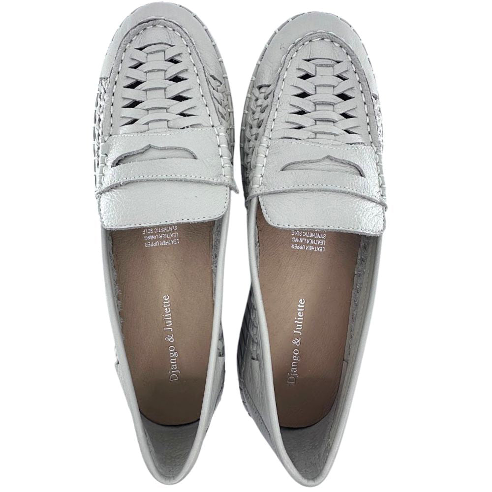 Pair of beige leather loafers with woven design on a white background