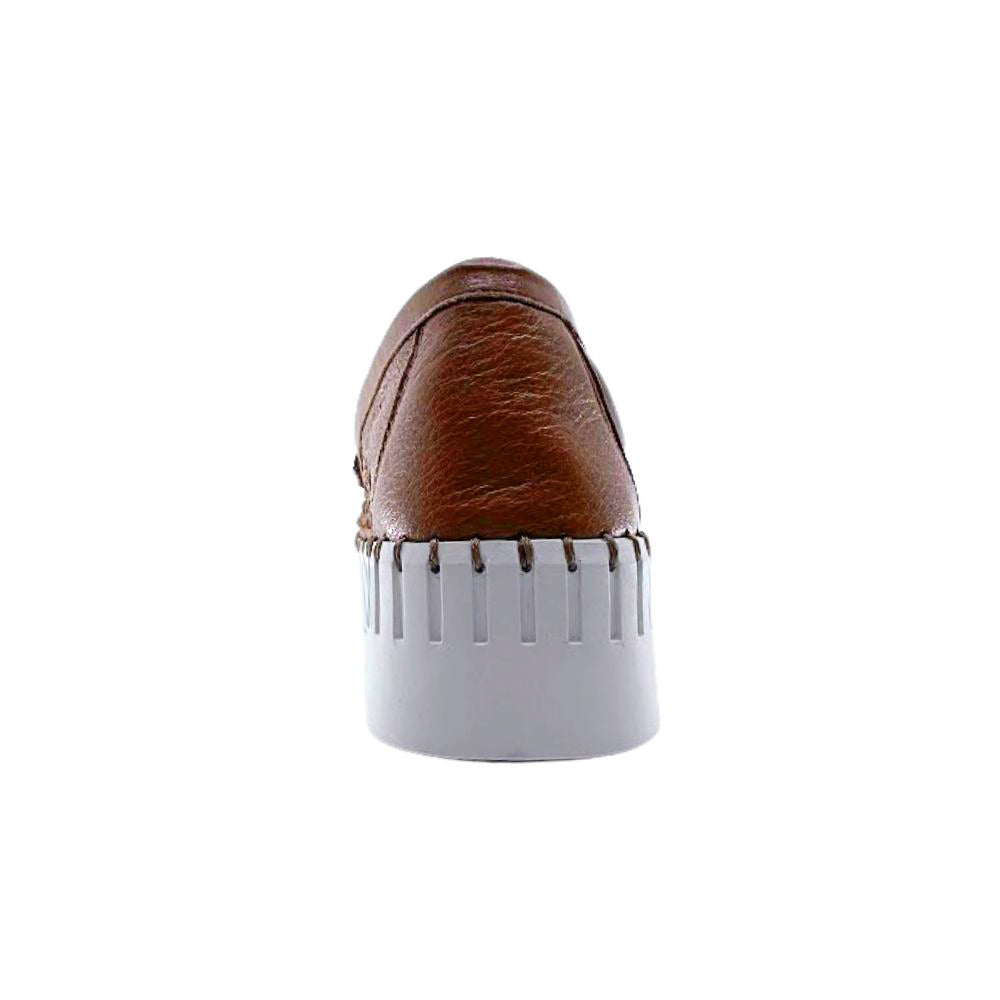 Tan woven leather platform loafer with a white sole on a white background