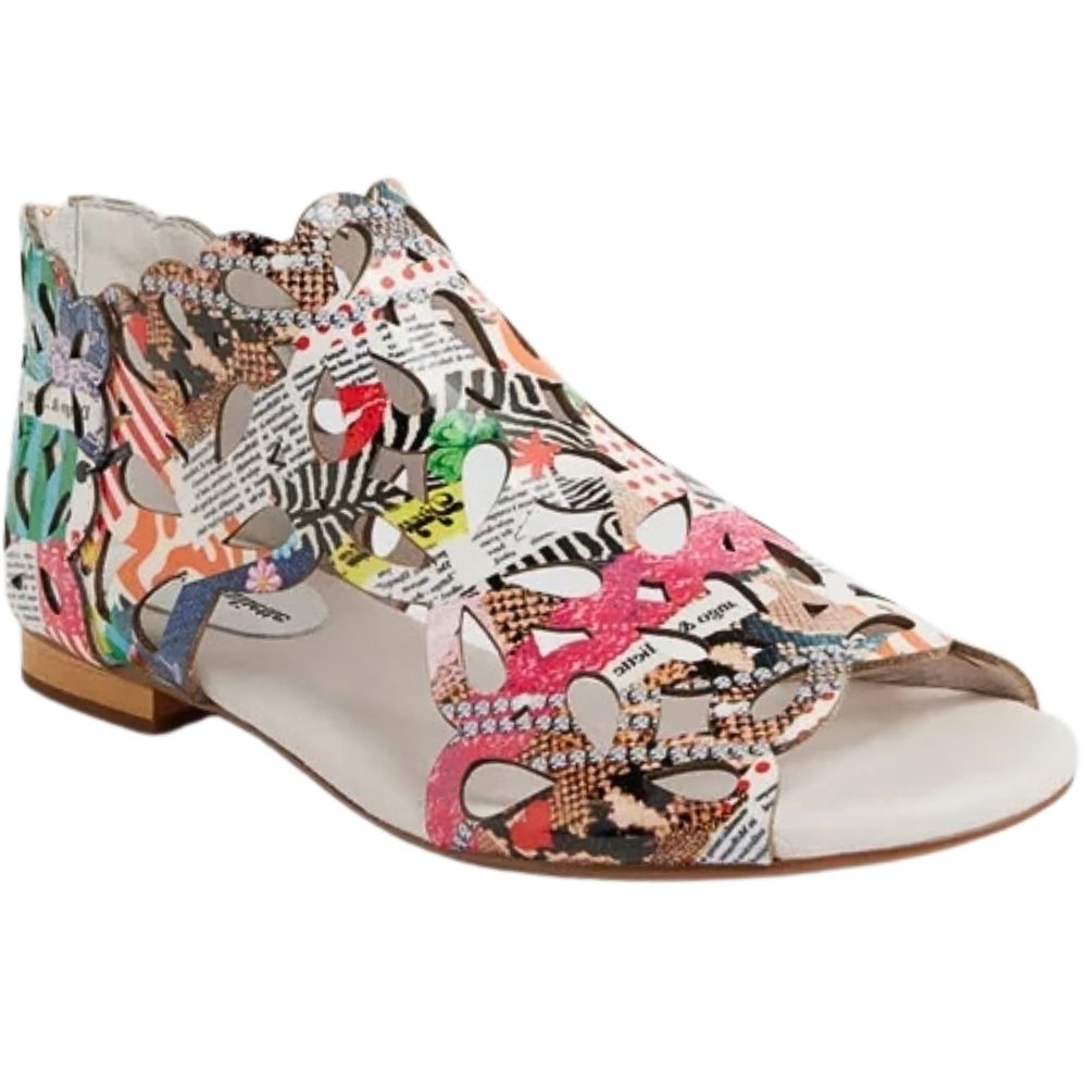 A single women's flat sandal with an open toe and a multicolor abstract collage print on a white base, featuring a low brown block heel.