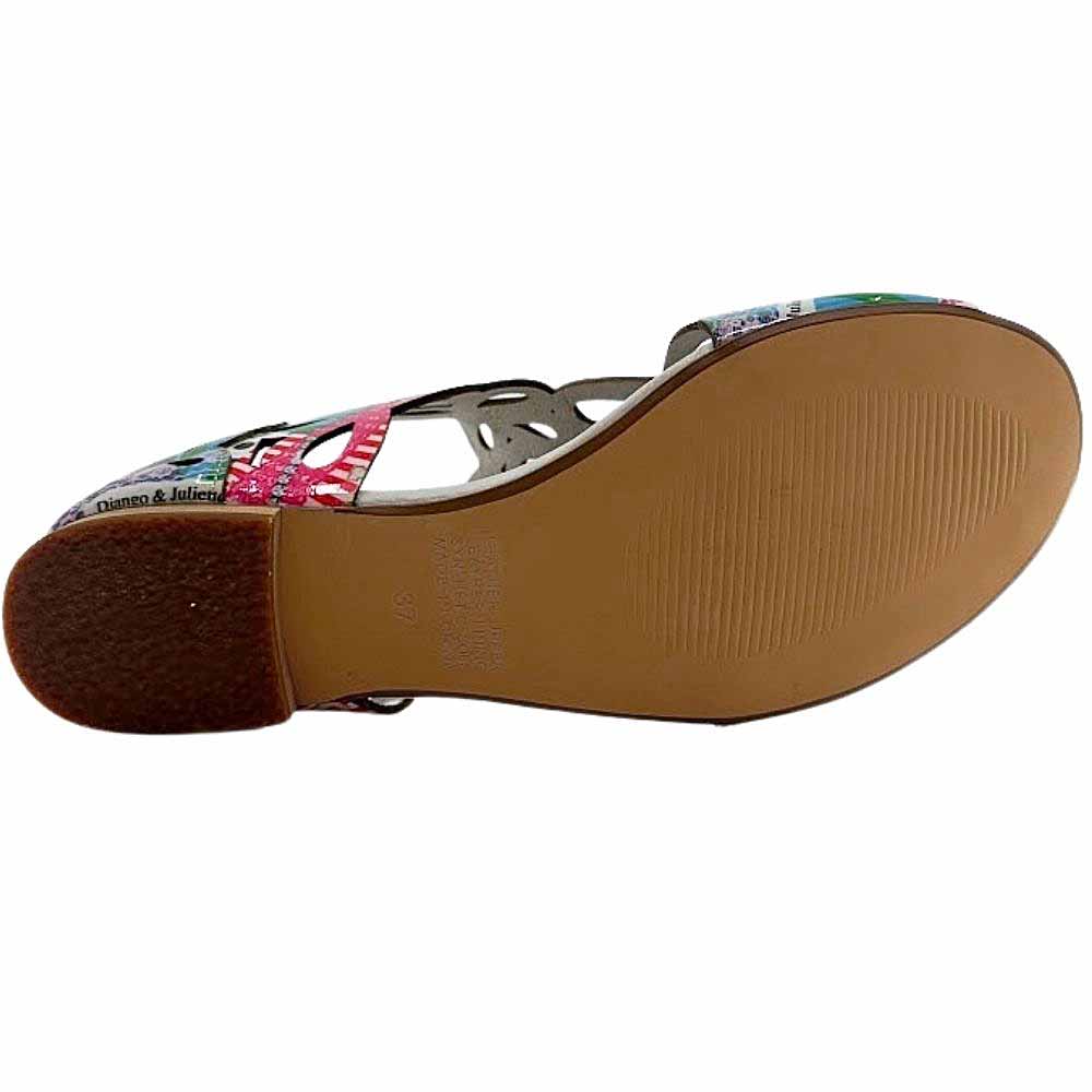 The brown outsole of a sandal showing a textured rubber heel and an outsole with a tread pattern, against a white background.