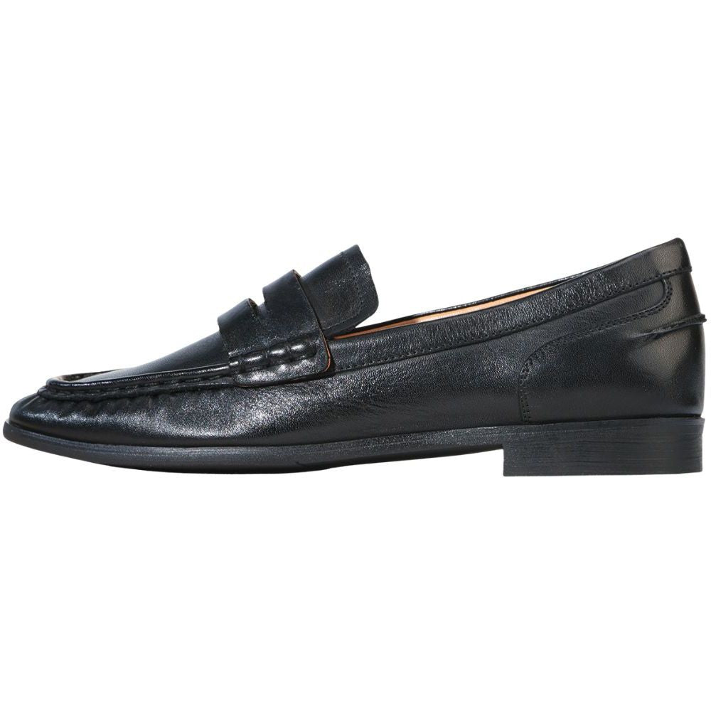 Black leather loafer shoe on a white background