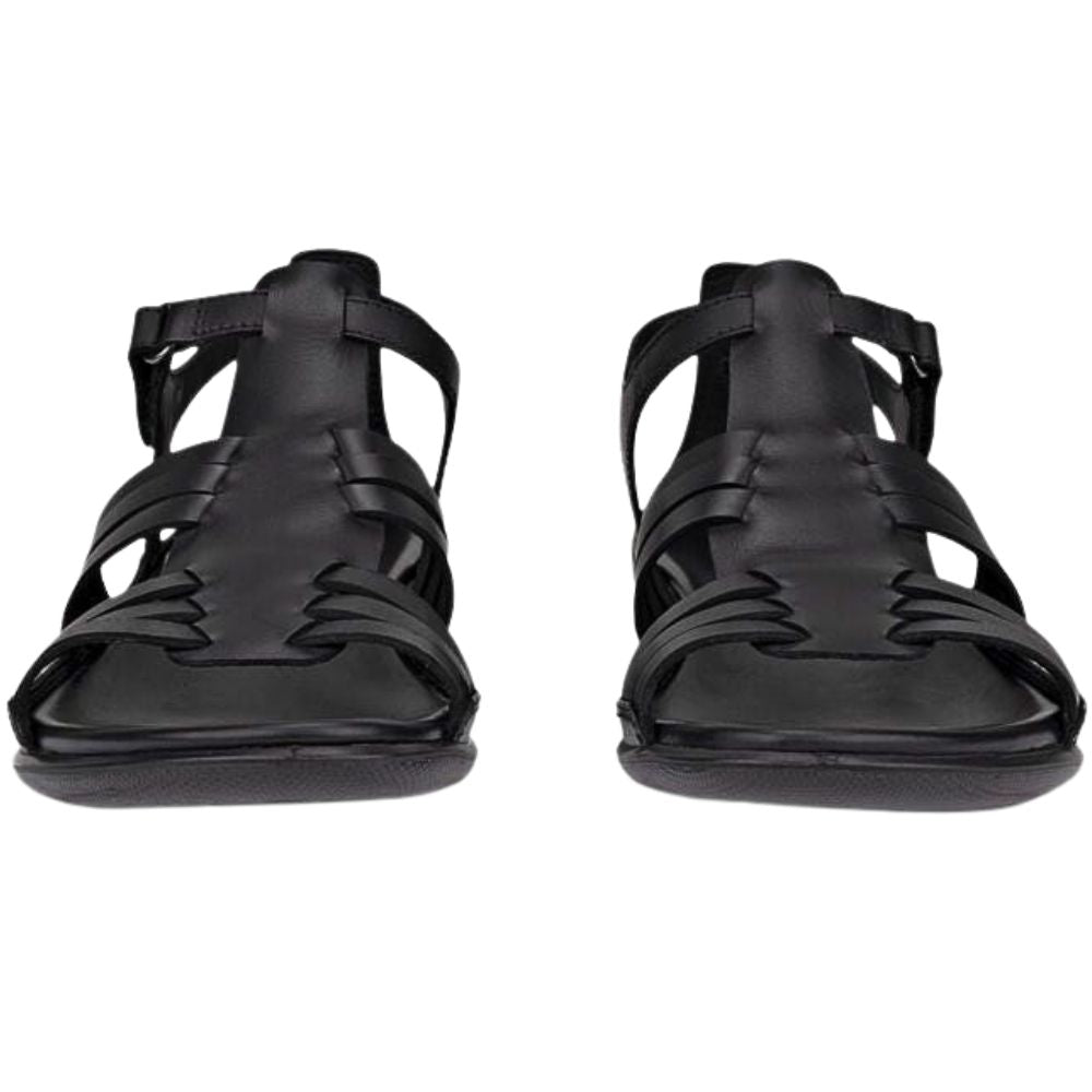 A pair of black leather strappy sandals shown from the front on a plain white background.