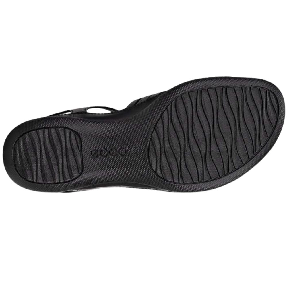 Black textured shoe sole with wavy tread pattern and embossed brand logo, shown from a top-down view on a white background.
