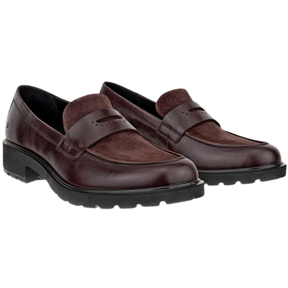 Pair of brown loafers on a white background