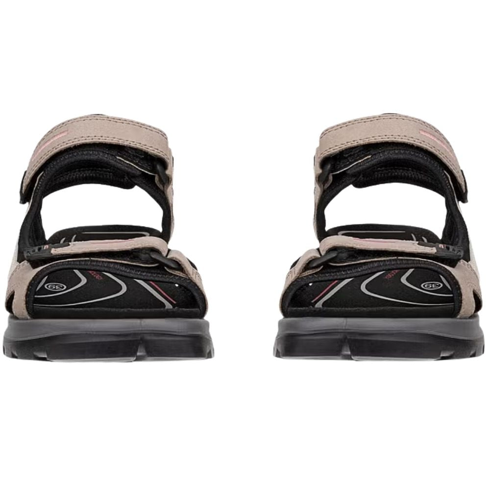 A pair of women's offroad sandals shown from the front on a plain white background. The sandals feature a black and light beige/tan color scheme with pale pink accents.