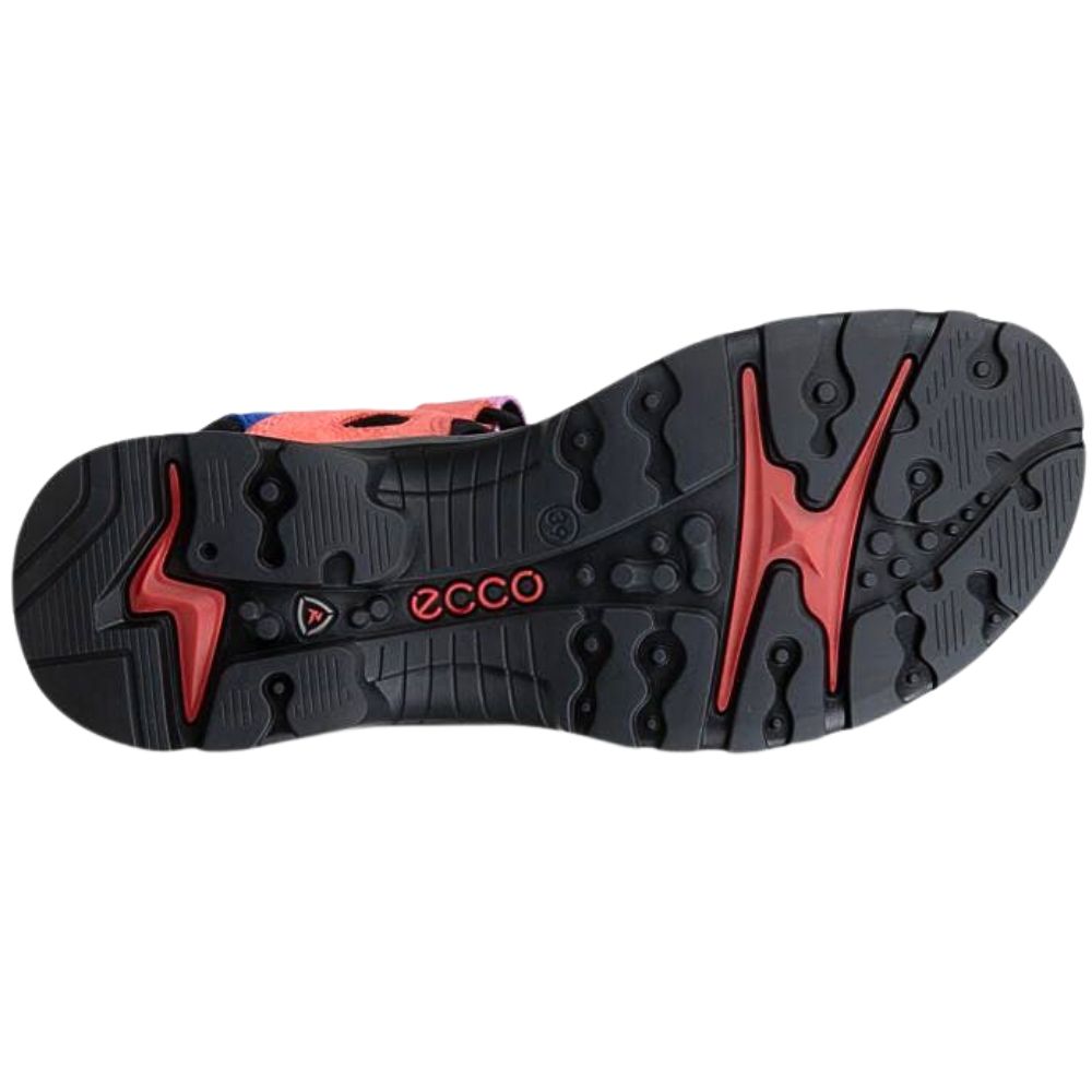 The outsole of a black and red Ecco shoe, showing the brand name 'ecco' in red on the black tread, photographed against a solid white background.