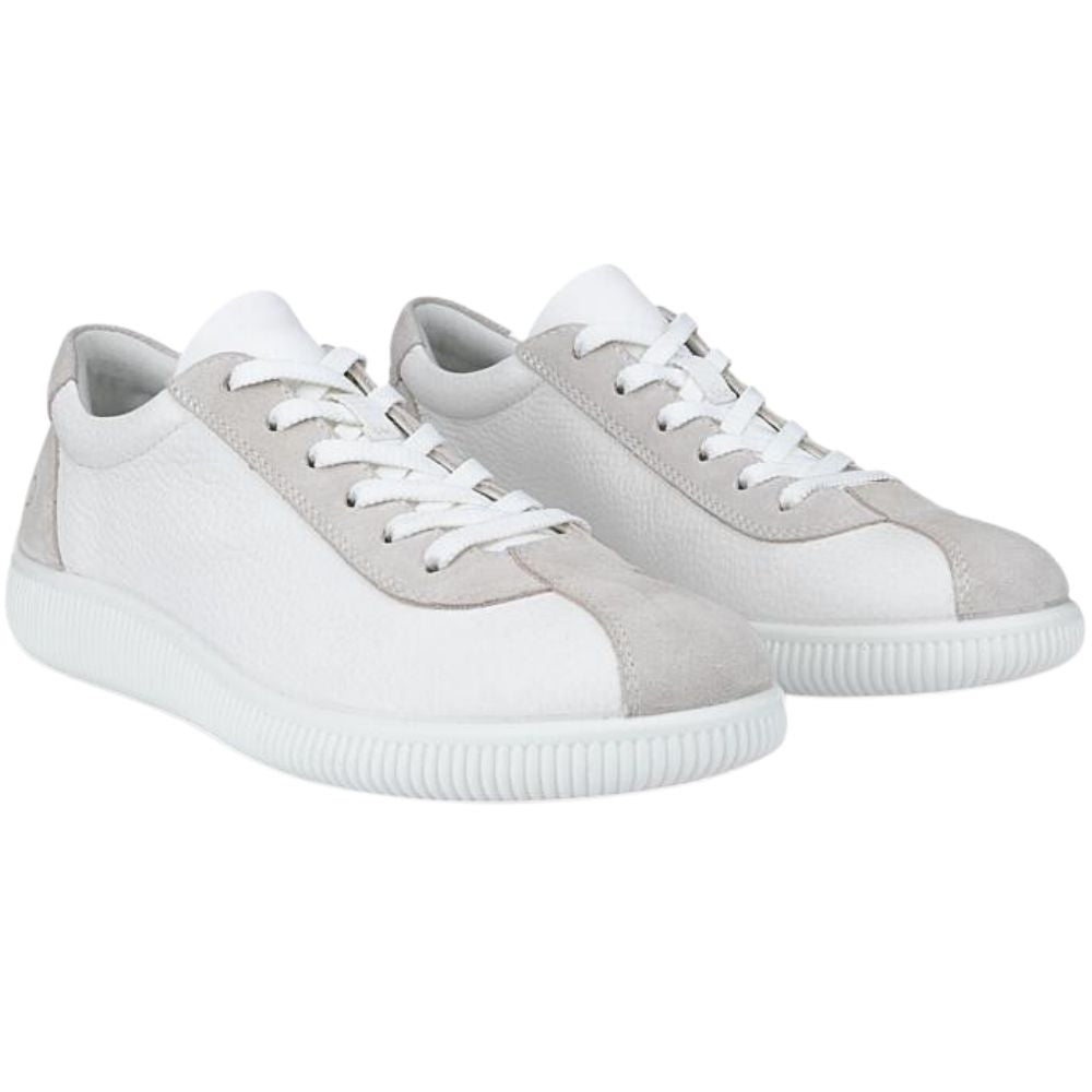 A pair of low-top sneakers in white and light grey, featuring textured leather panels, white laces, and a thick ribbed white sole, shown against a plain white background.