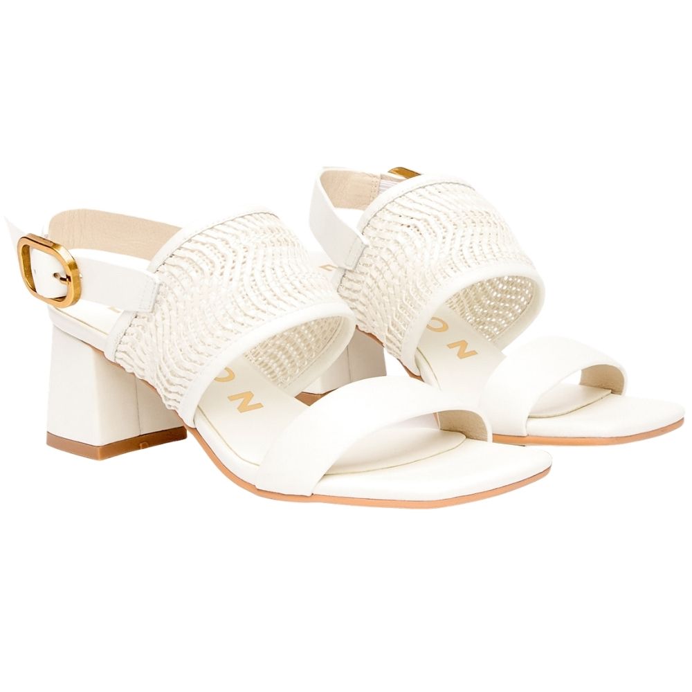 White strappy heeled sandals with woven upper straps, a square block heel, and a gold buckle detail, shown on a white background.