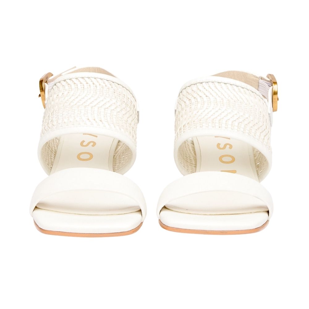 A pair of white woven sandals with gold buckle details and gold lettering on the insole, shown from a front-facing perspective on a white background.