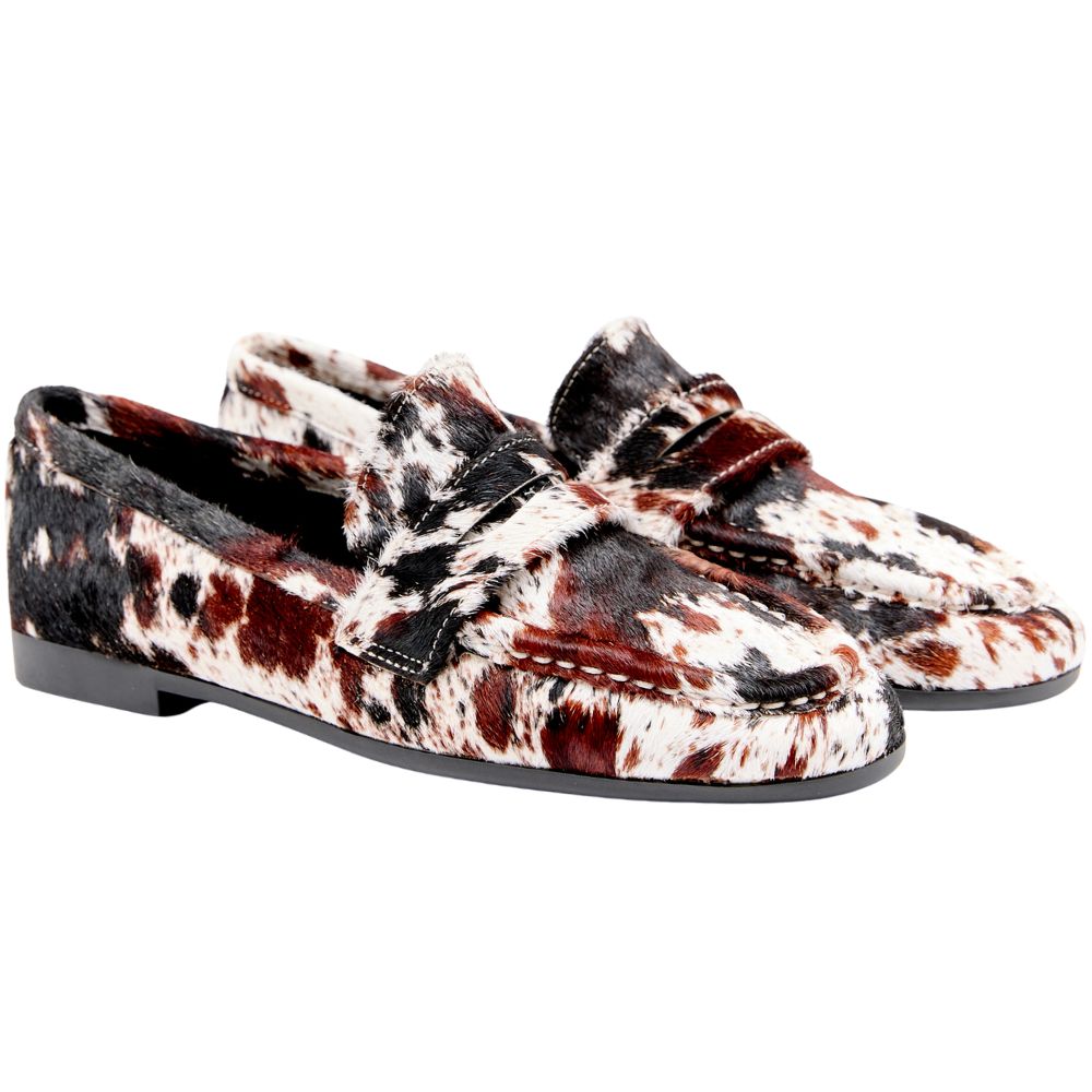 Pair of patterned animal print loafers on a white background