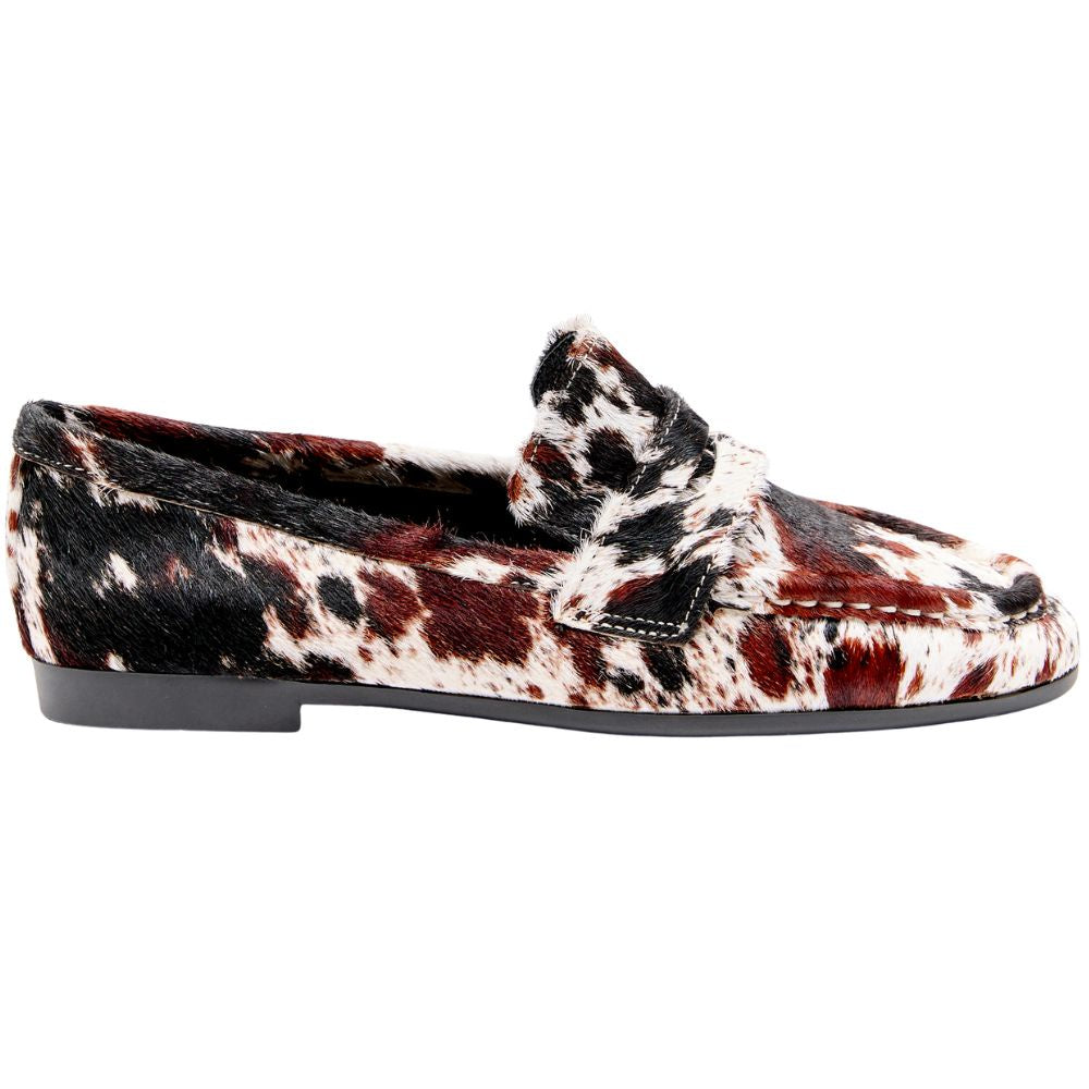 Loafer with animal print pattern on a white background