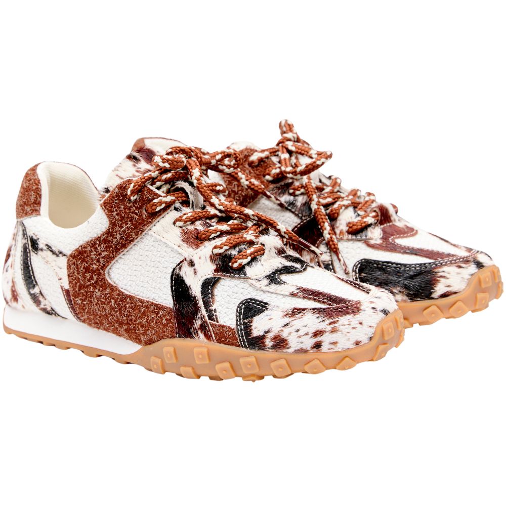 Sneaker with a unique animal print pattern on a white background