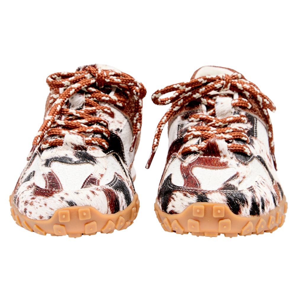 Pair of animal print patterned sneakers with brown laces on a white background