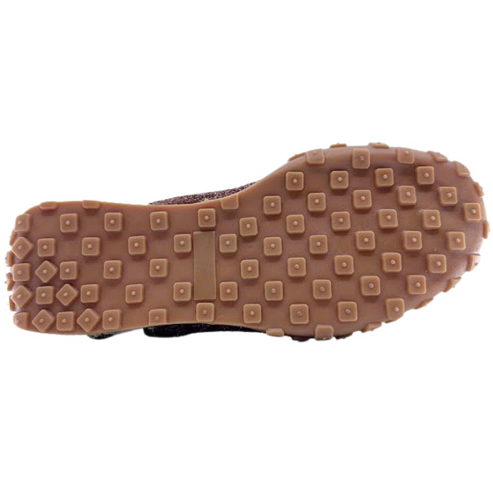 Close-up of a shoe sole with textured surface on a white background