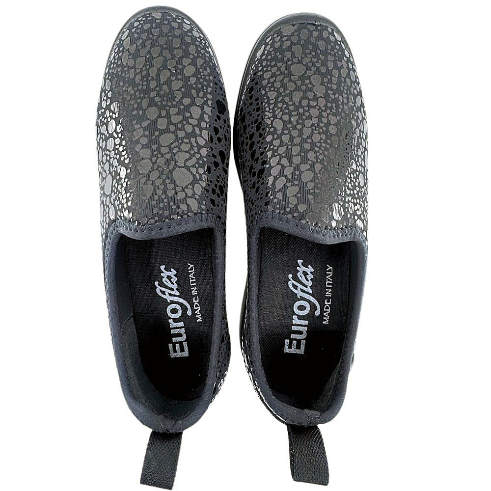 Pair of black slip-on shoes with textured surface and Euroflex branding on a white background