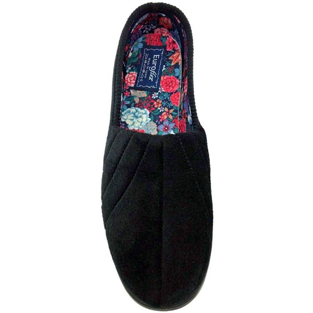 Black slipper with floral lining on a white background