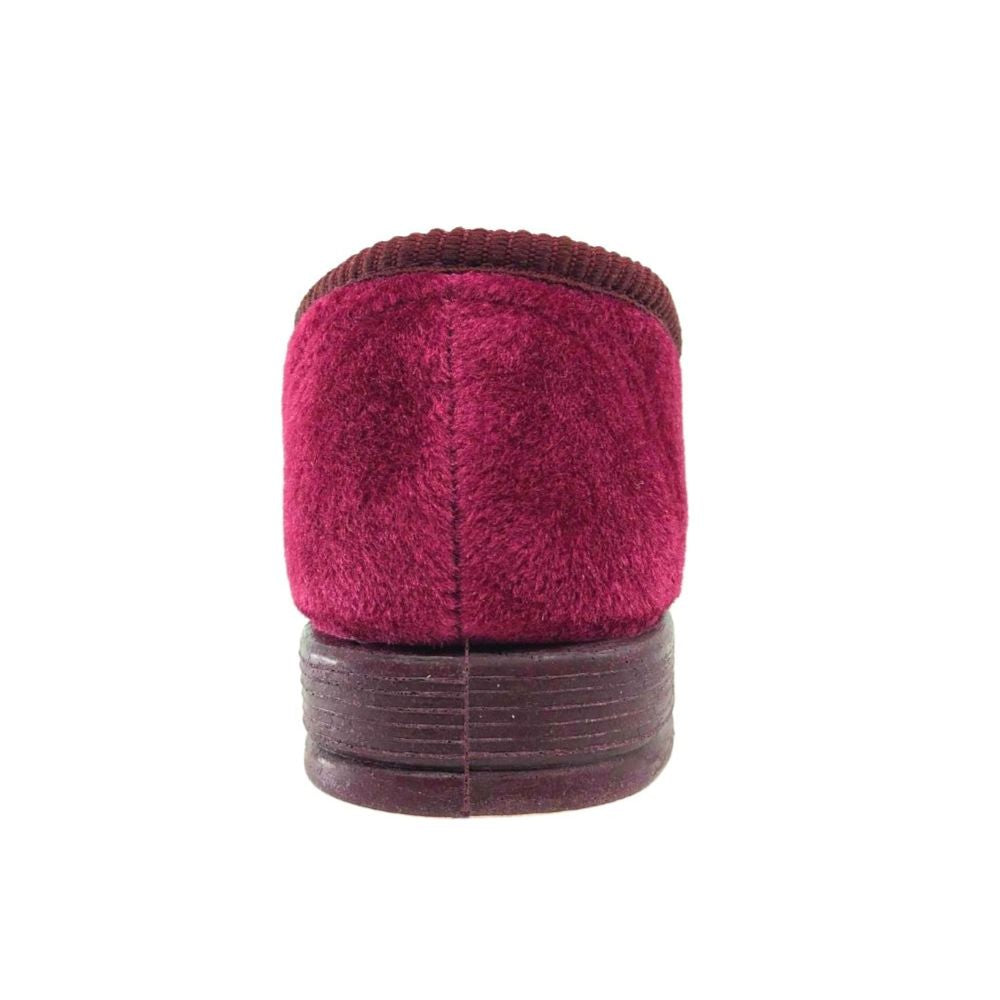 Burgundy slipper shoe on a white background