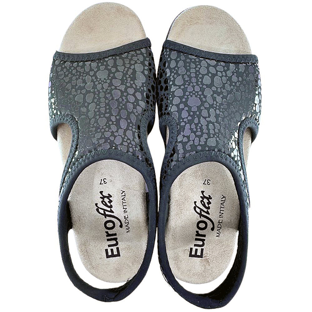 Pair of black textured sandals on a white background