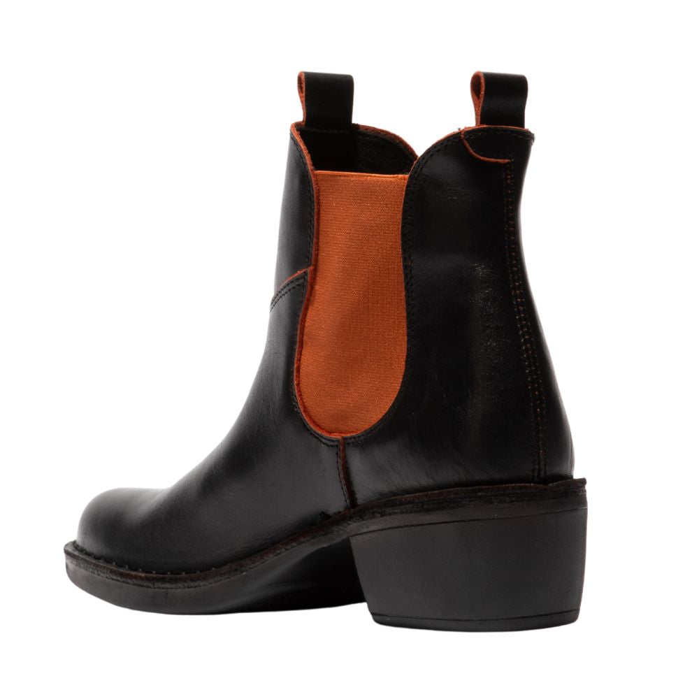 Black leather Chelsea boot with a brick coloured gusset on a white background