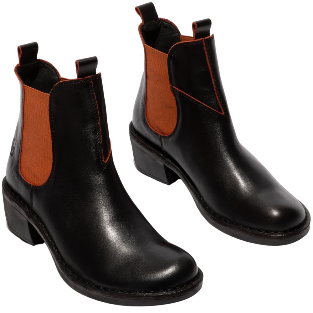 Pair of black leather Chelsea boots with brick coloured accents on a white background