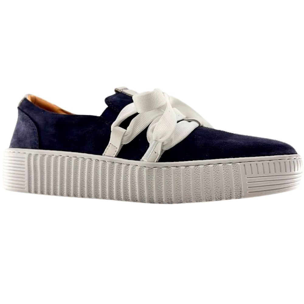 Navy blue suede sneaker with a decorative white lace and cleated sole on a white background.