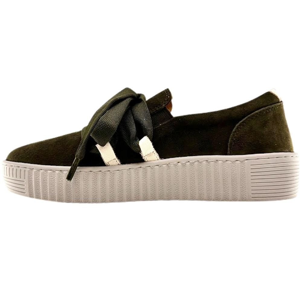 Olive suede leather sneaker with decorative laces and a cleated platform sole on a white background.